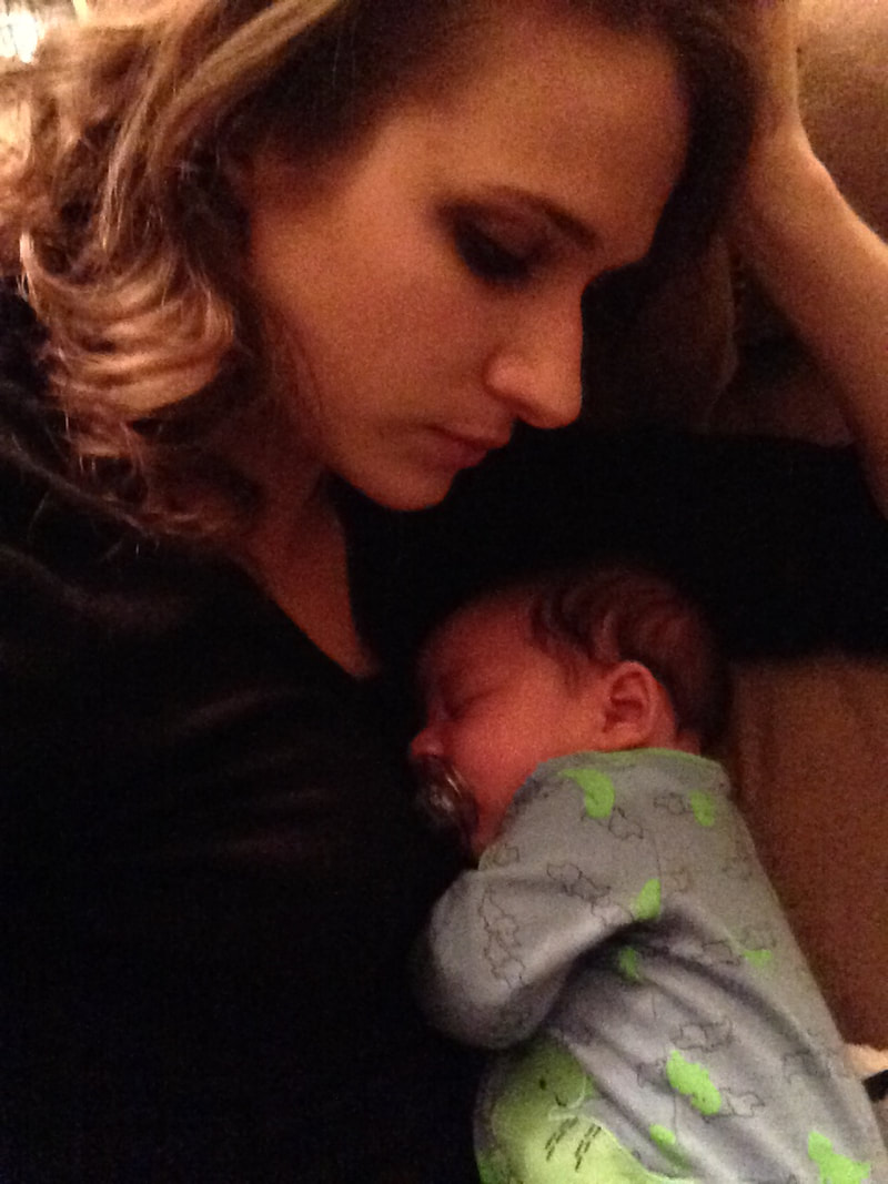 Char and newborn Emmanuel sleeping